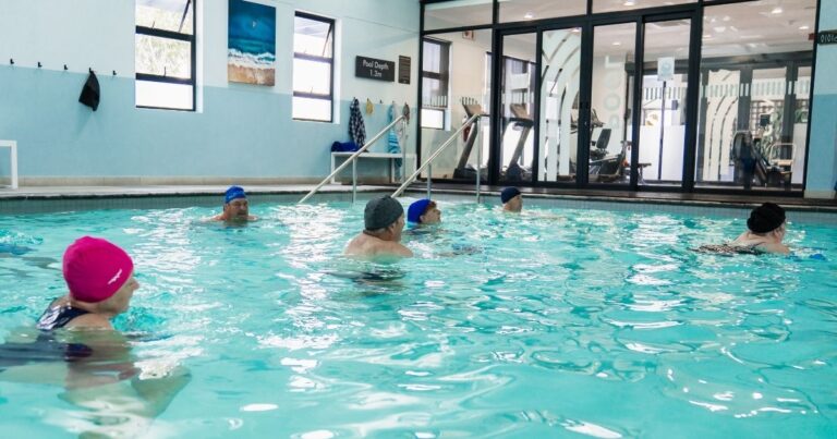 The indoor heated aerobics pool and boutique gym at Oasis Life Burgundy Estate